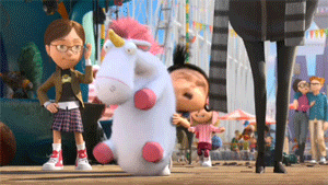 Stuffed Unicorn Held by Girl