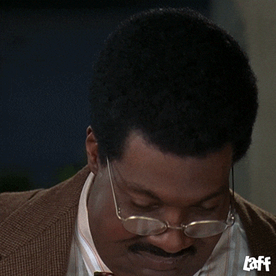 Stunned Eddie Murphy Looks Up GIF