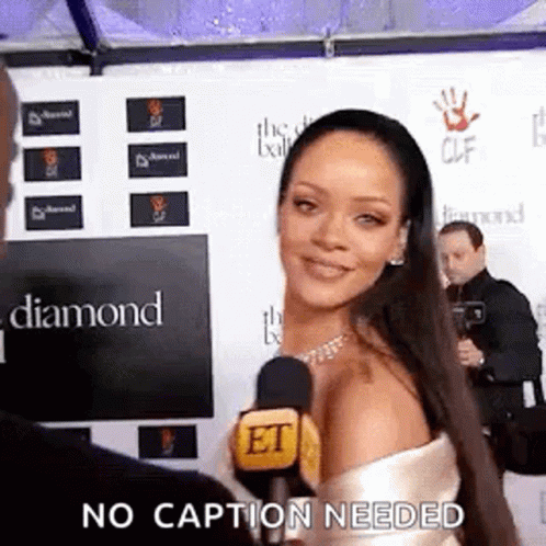 Stunning Rihanna Winking No Caption Needed GIF