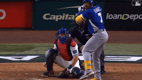 Suarez Baseball Player Swinging at Pitch