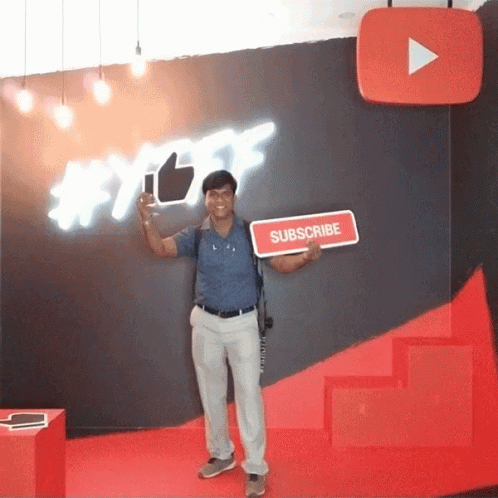 Holding Like And Subscribe Button Placard GIF