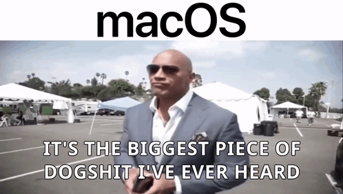 Suit and Sunglasses Man Says Macos Is Dogshit