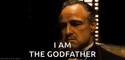 Suit and Tie Man on Stage with Wrestler Logo