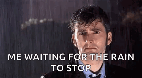Suit And Tie Man Says Me Waiting For Rain GIF