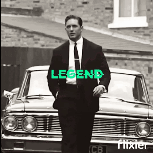 Suit Man Beside Car with Legend