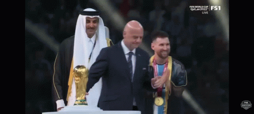 Suit Man Holding Trophy, White Robe Man