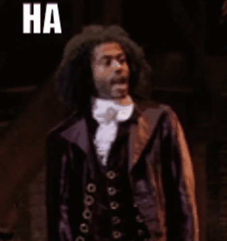 Suit Man Says Yeah Right To Another GIF