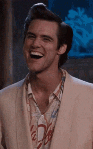 Suited Man Laughing In Coca Cola Shirt