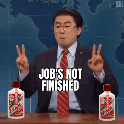 Suited Man Says Job's Not Finished Two Liquor Bottles