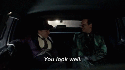 Suited Men in Car Saying A Little Thicker