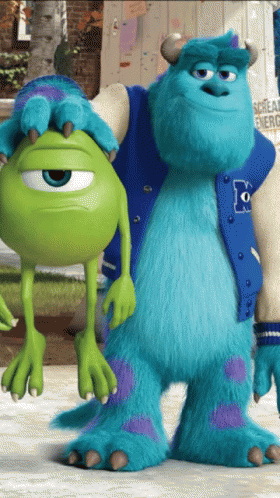 Sulley And Mike From Monsters Inc Are Standing Next To Each Other GIF