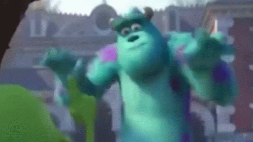 Sulley From Monsters Inc Is Dancing In Front Of A Building In A Blurry Photo . GIF