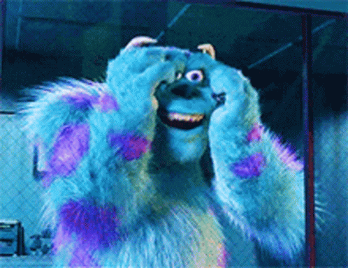 Sulley From Monsters Inc Is Smiling And Covering His Eyes With His Hands GIF