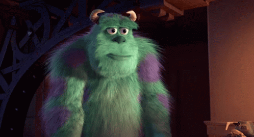 Sulley From Monsters Inc Is Standing In Front Of A Pillar GIF