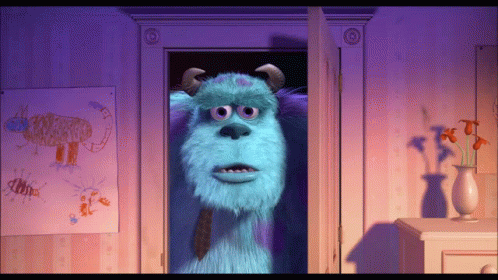Sulley From Monsters Inc Is Standing In The Doorway GIF