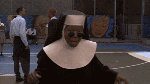 Sunglass-Wearing Nun in White Hat on Basketball Court