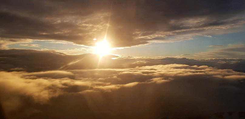 Sunrise Between Clouds GIF