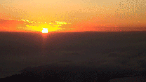 Sunrise Bursting Above Clouds GIF