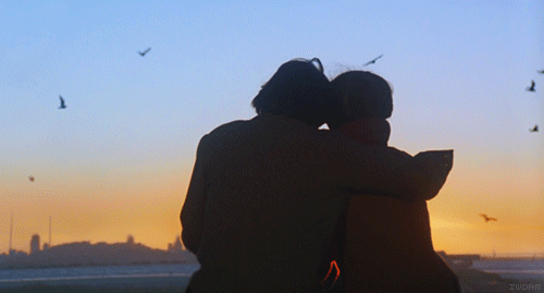 Sunset Couple Hug GIF