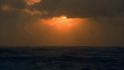 Sunset Over Ocean With Clouds GIF