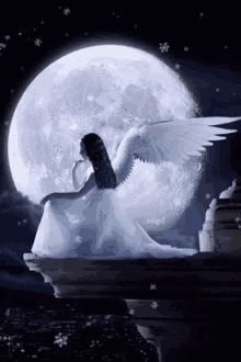 Super Moon And Angel On Cliff GIF