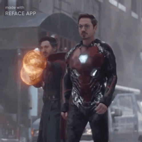 Superhero And Wizard Holding Fireball GIF