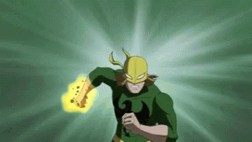 Superhero in Green and Yellow Running With Object