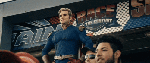 Superhero Man in Front of Race Sign