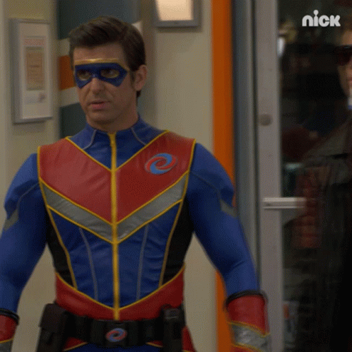 Superhero Man Standing Before Nick Door