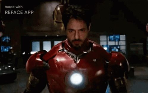 Superhero Next to Wizard Holding Fireball