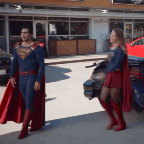 Superman and Supergirl Standing Together