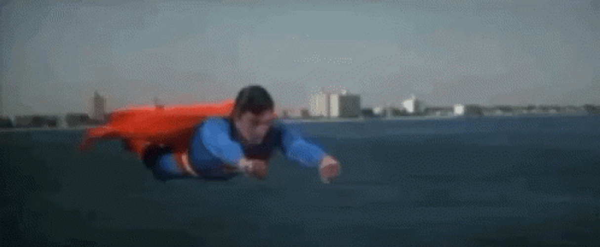 Superman Flying Above Sea GIF