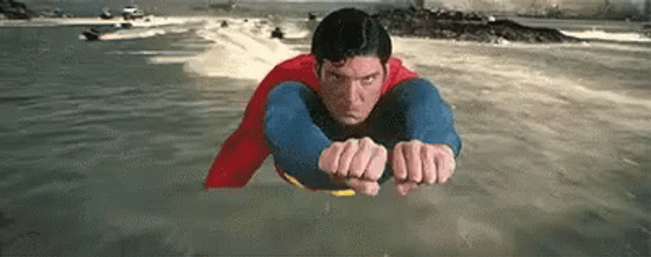 Superman Flying With Clenched Fist GIF