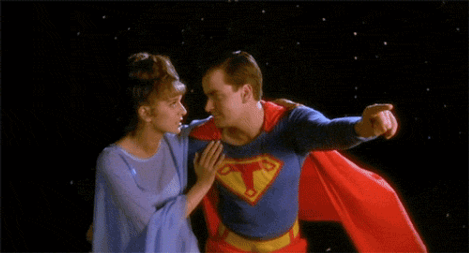 Superman Flying With Woman And Bird GIF