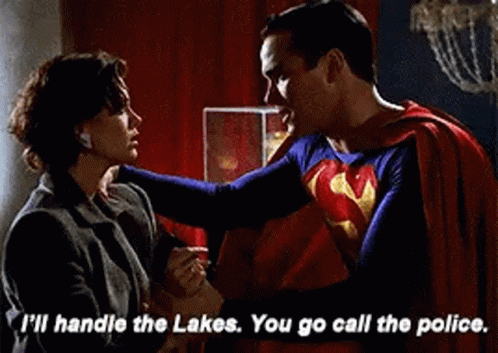 Superman Holding Woman's Hand And Talking GIF