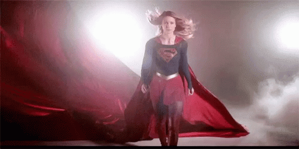 Superwoman With Long Red Cape GIF