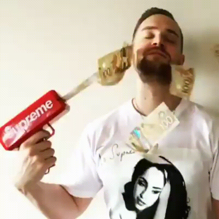 Supreme Money Spray Gun High Roller GIF
