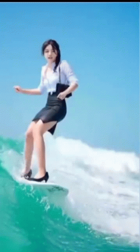 Surfing Asian Woman Falling GIF