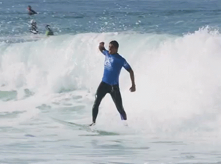 Surfing Fist Pump Yeah GIF