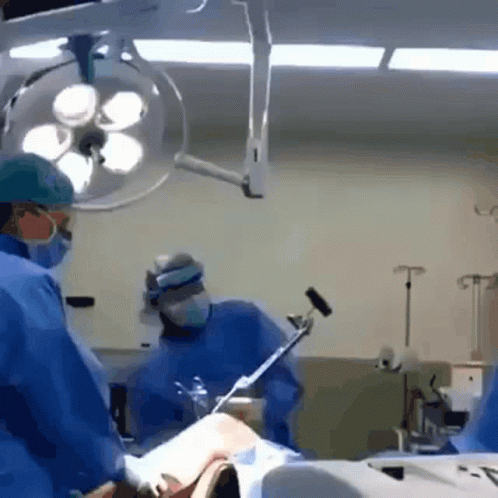 Surgeon Operating on Patient