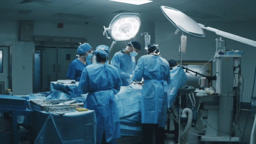 Surgeons Performing Surgery on Patient
