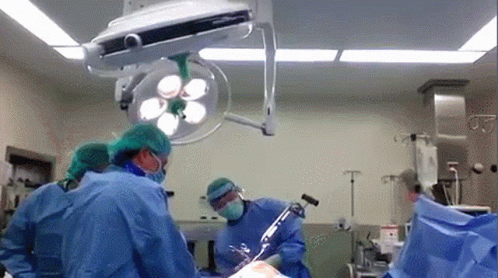 Surgeons Performing Surgery on Patient