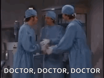 Surgeons Talking in Operating Room