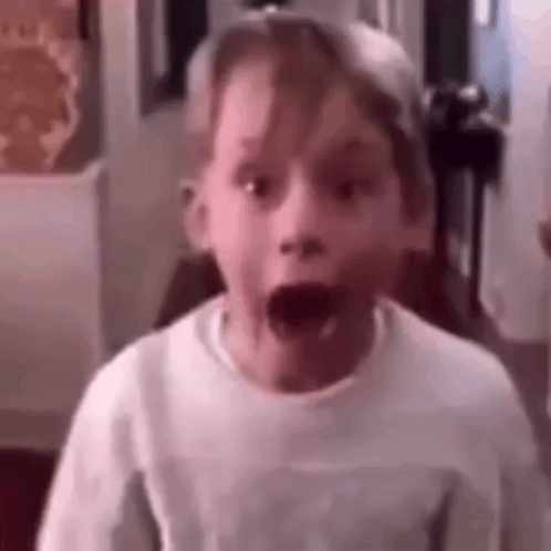 Surprised Boy Wearing Hat and White Shirt