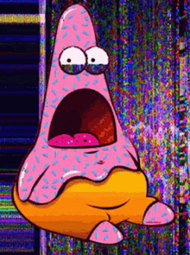 Surprised Cartoon Character Covered In Sprinkles GIF
