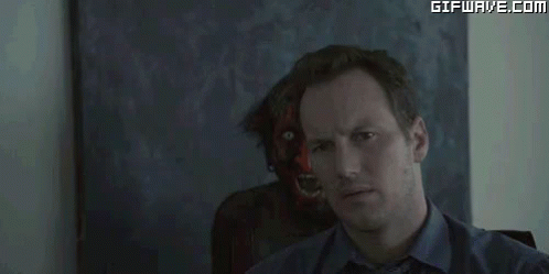 Surprised Cartoon Character Next To Man GIF