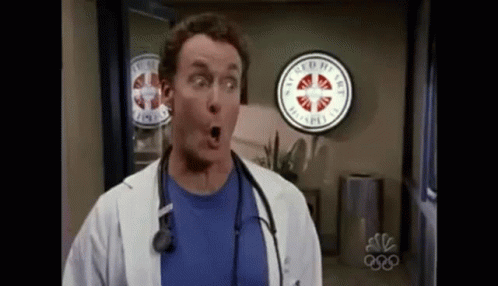 Surprised Doctor with Emergency Sign