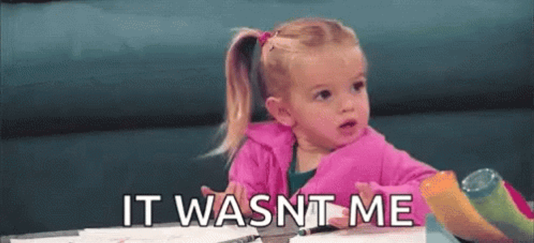 Surprised Kid In Pink Jacket It Wasnt Me GIF