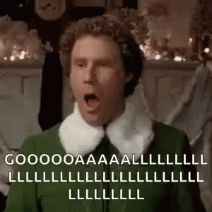 Surprised Man In Green Elf Costume GIF