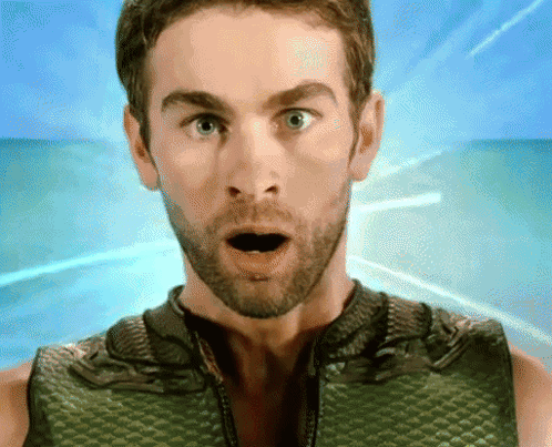Surprised Man In Green Vest GIF